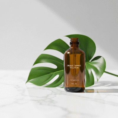 Eco-friendly organic tanning lotion bottle with botanical leaves